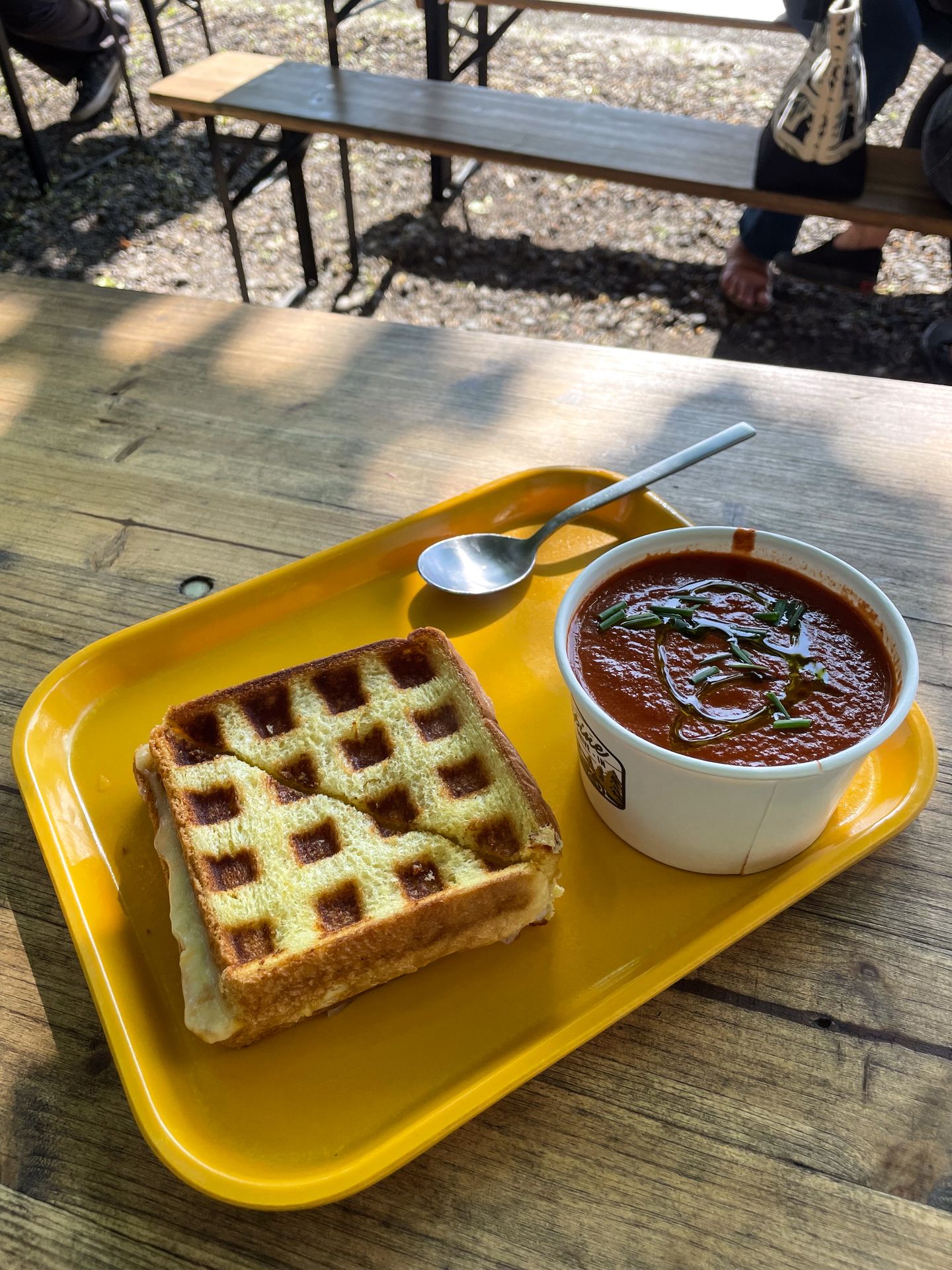 Grilled cheese and tomato soup on a yellow tray from Sugarpine Drive-In