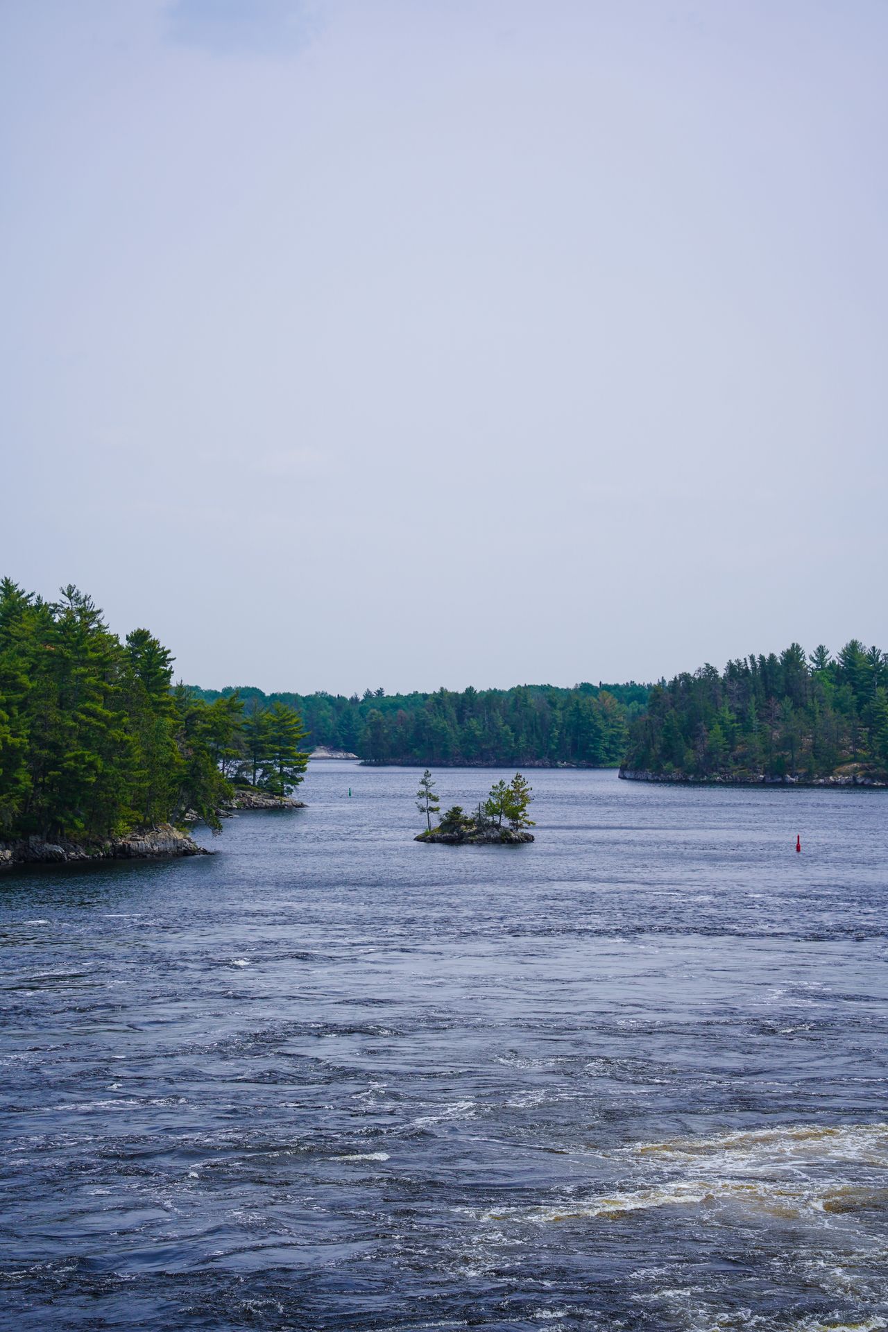 A small island seen from the dam at the Kettle Falls Hotel