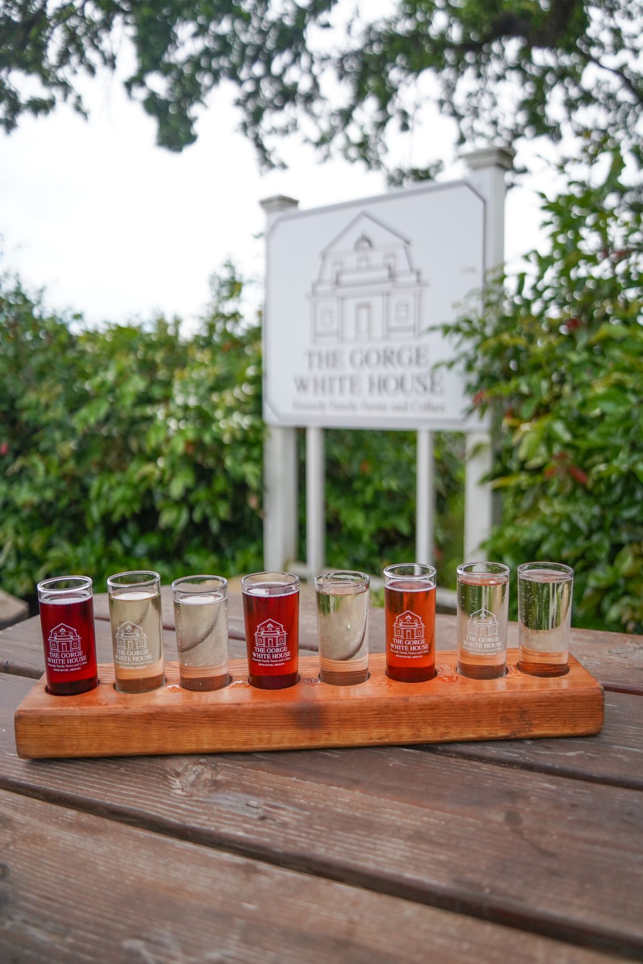 A flight with 8 ciders from the Gorge White House