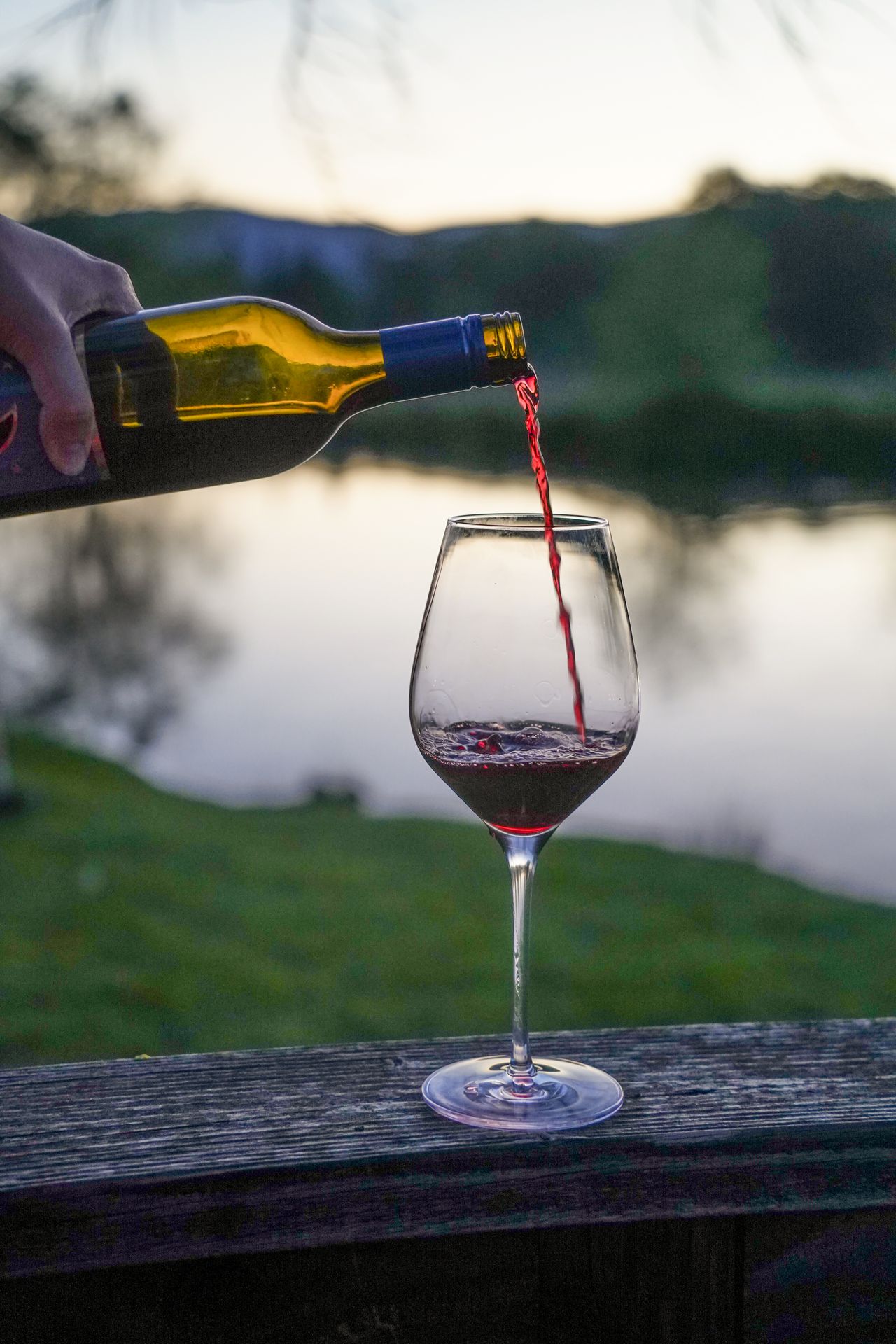Pouring wine into a glass at Bridgeview Winery in Cave Junction