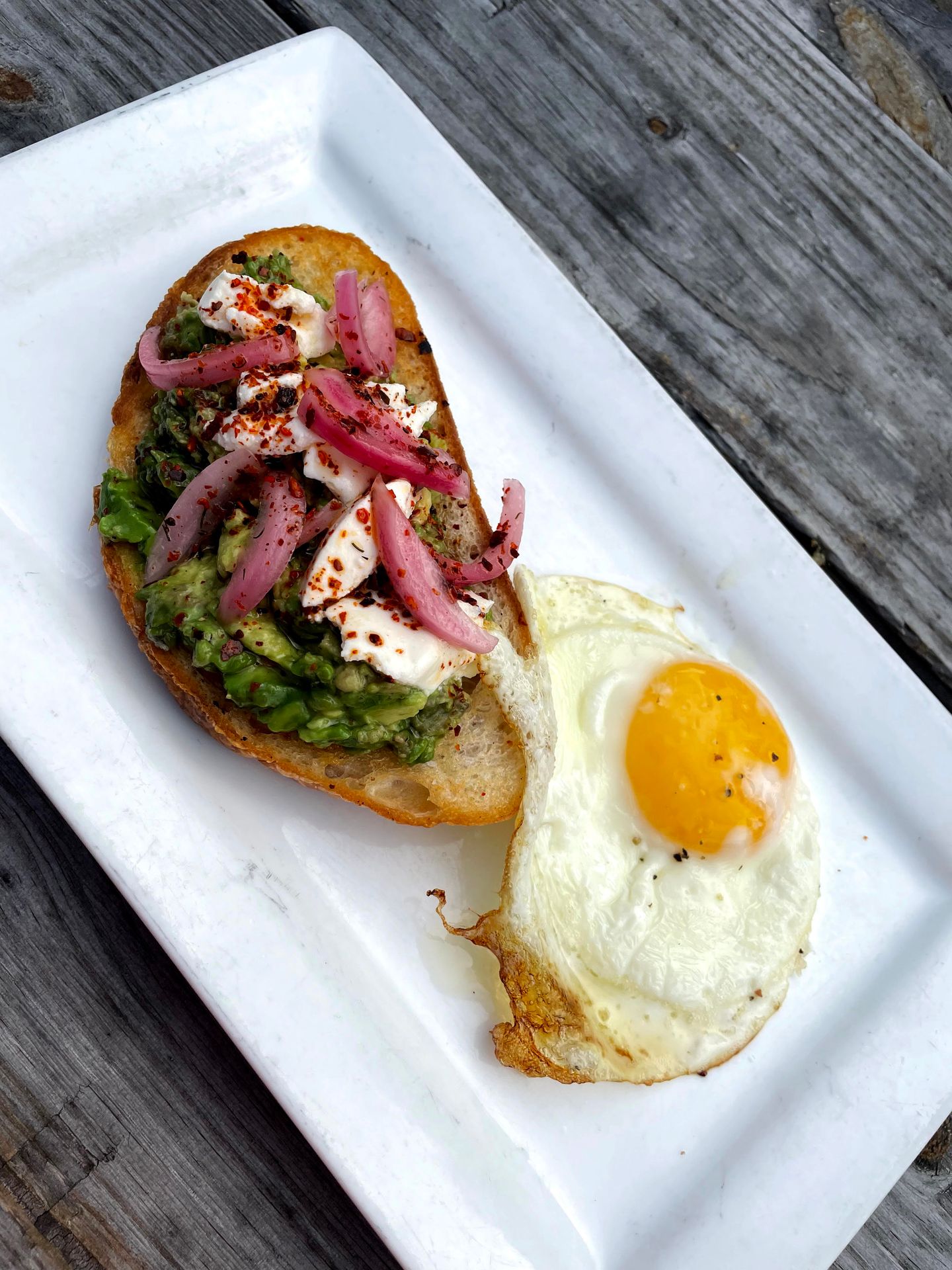 Avocado toast and a fried egg from Wood Iron Eatery.