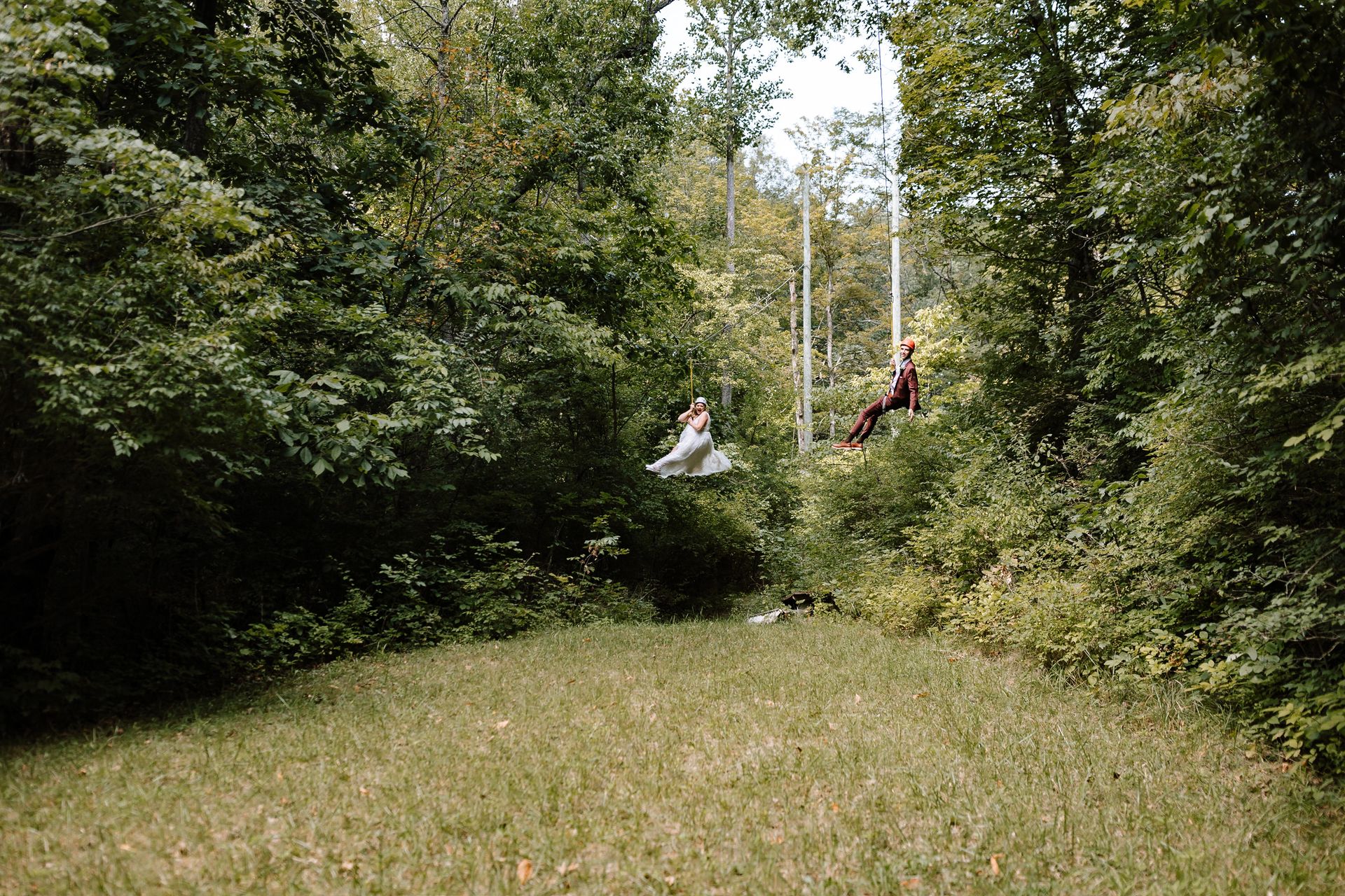 Lydia and her husband ziplining on their wedding day